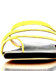 Yellow slide sandal with no straps on a white background